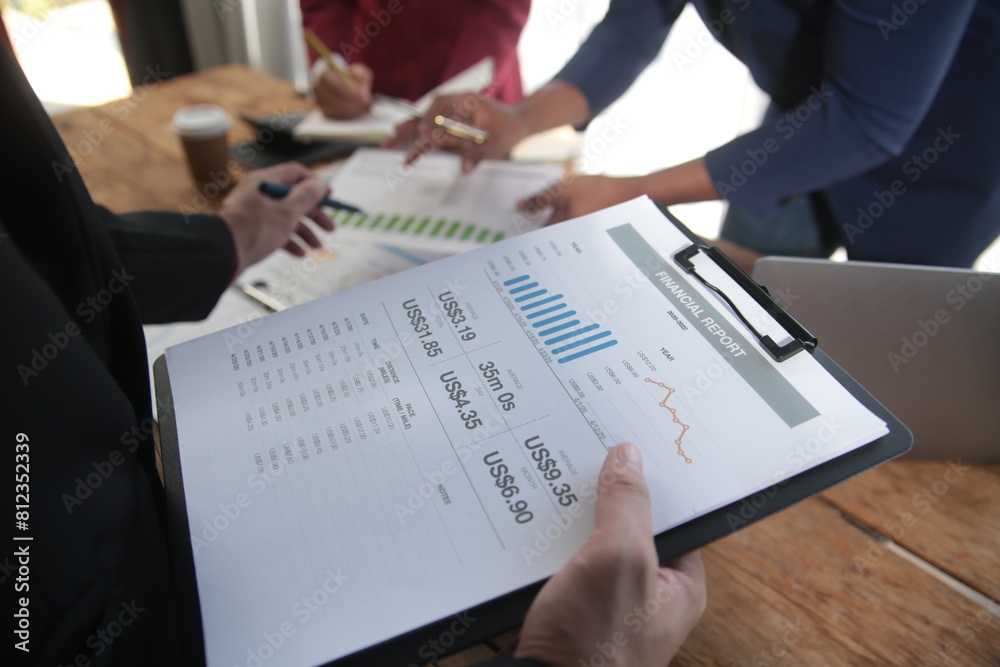 Business team meeting working with new startup project, discussion and analysis data the charts and graphs. Digital tablet, calculator, laptop computer using, Business finance and accounting concept. Business team meeting working with new startup project, discussion and analysis data the charts and graphs. Digital tablet, calculator, laptop computer using, Business finance and accounting concept.