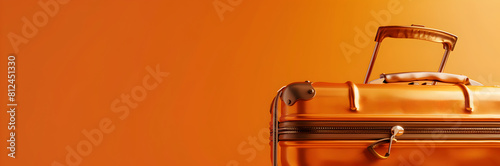 Eye-catching luggage handle cover web banner. Luggage handle cover isolated on orange background with copy space.