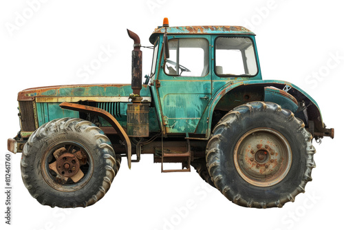 An old, rusted green tractor with a rusty wheel