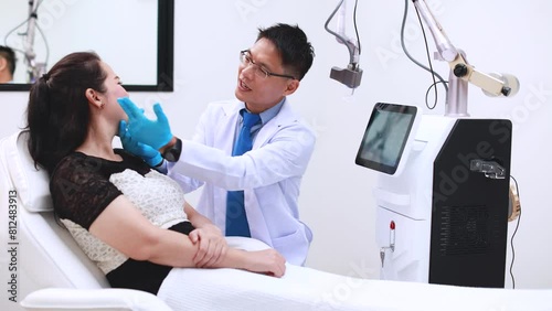 Laser Machine.Young woman receiving laser treatment.Skin Care.Young Woman Receiving Facial Beauty Treatment, Removing Pigmentation At Cosmetic Clinic.IPL. Photo Facial Therapy.Anti-aging Procedures.