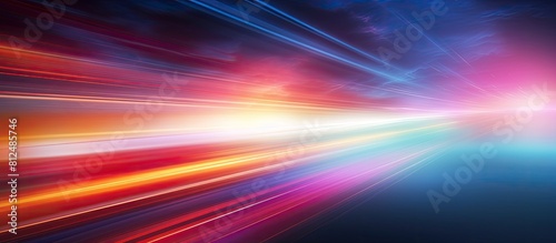 Blurred light trails create a vibrant and colorful background with plenty of copy space image