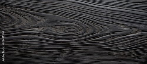 Close up image of black wenge oak showcasing the intricate texture and natural patterns resembling ebony wood Copy space image with a background