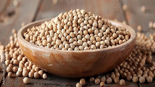 Paint a picture of the earthy, nutty fragrance of coriander seeds, a staple in Indian spice blends, adding a complex flavor to dishes photo