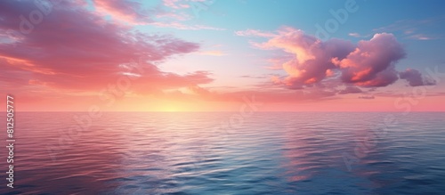A serene blue and pink sunset reflecting on the tranquil water creating a captivating copy space image
