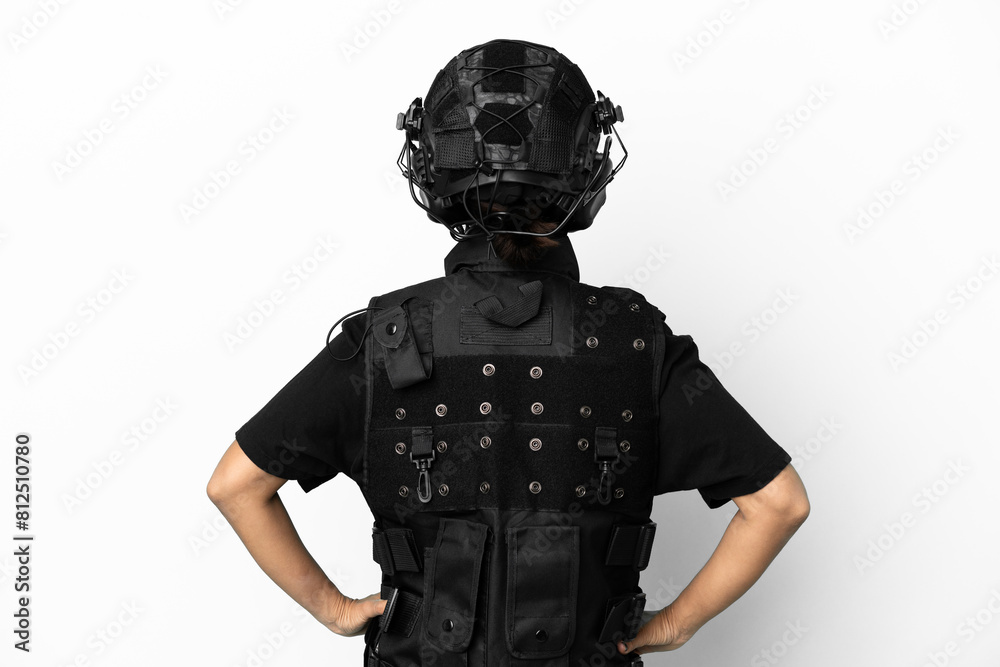 SWAT woman isolated on white background in back position SWAT woman isolated on white background in back position