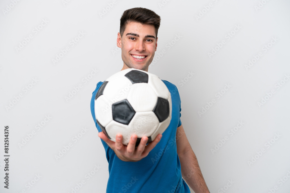 Young caucasian man isolated on white background with soccer ball Young caucasian man isolated on white background with soccer ball