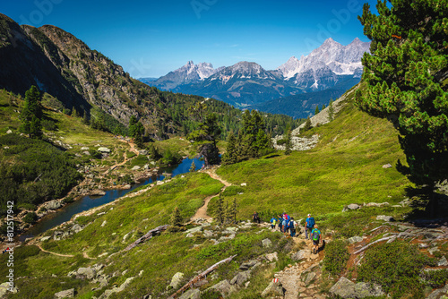 Hikers on the trail near Spiegelsee Lake, Styria, Austria