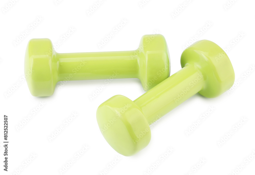 Light green dumbbells isolated on white. Sports equipment Light green dumbbells isolated on white. Sports equipment