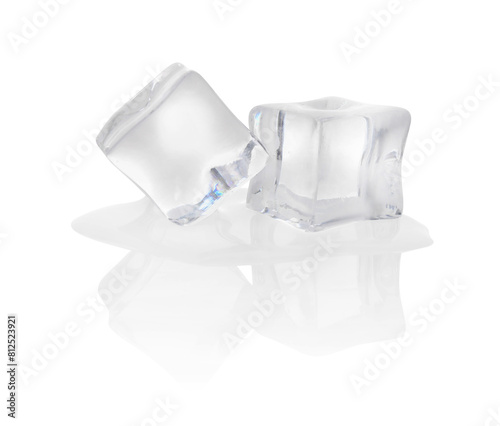 Melting crystal clear ice cubes isolated on white