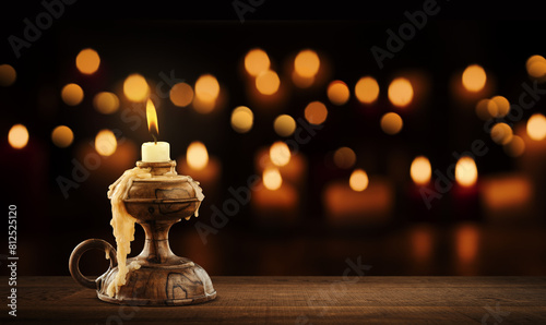 Lit candles burning in the Church photo