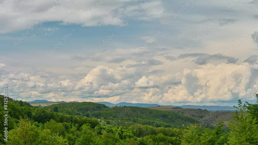 Nature landscape cumulus clouds rolling over hills and mountains time-lapse Nature landscape cumulus clouds rolling over hills and mountains time-lapse