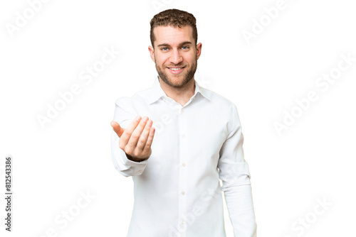 Young handsome blonde man over isolated chroma key background inviting to come with hand. Happy that you came photo