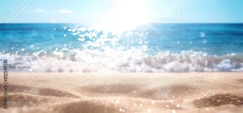Sunny Serenity  Blue Sea and Sandy Shoreline with Sunlight Sparkling in Defocused Glittering Waves