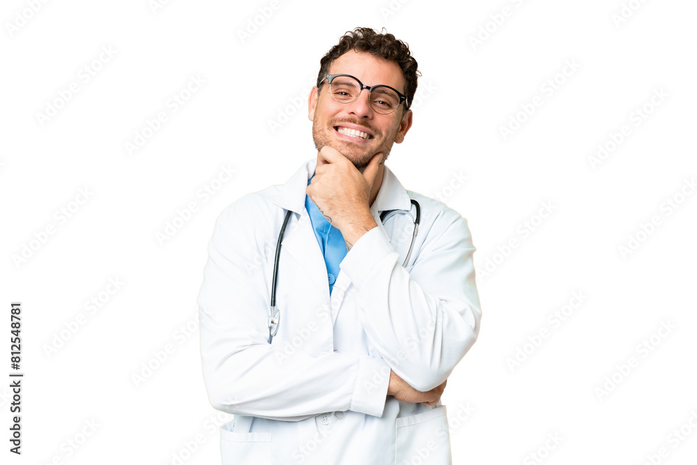 Brazilian doctor man over isolated chroma key background with glasses and smiling Brazilian doctor man over isolated chroma key background with glasses and smiling
