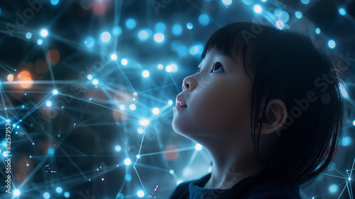 With a sense of wonderment and awe, a child gazes upon a futuristic network of glowing lines and dots, captivated by the promise of connectivity and innovation that defines the fut photo