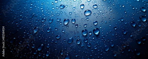 Water droplets on blue, embodying pure freshness.