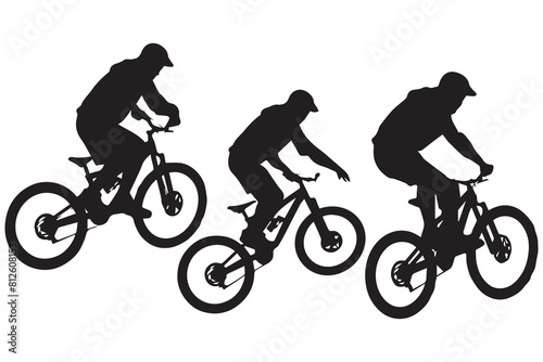 Black silhouettes of bicyclist rider jumping on a white background