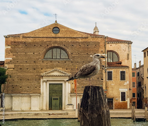 Facade of the Church of San Marcuola facing Grand Canal in Cannaregio district of Venice, Italy photo