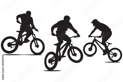 Black silhouettes of bicyclist rider jumping on a white background