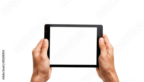 A person is holding a tablet with a white screen
