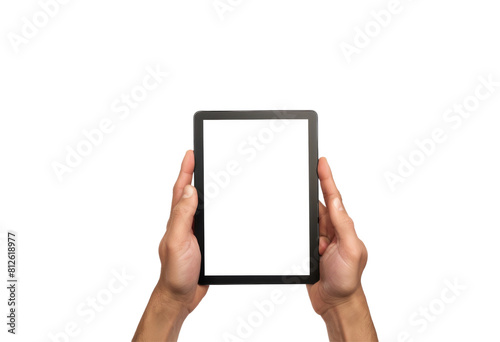 A person is holding a tablet with a white screen photo