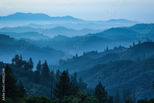 Layers of Blue Mountains in Early Morning, Calaveras County, CA - Landscape View of Misty photo