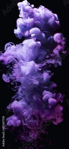 This image captures an ethereal blend of swirling pink and purple smoke plumes on a black background