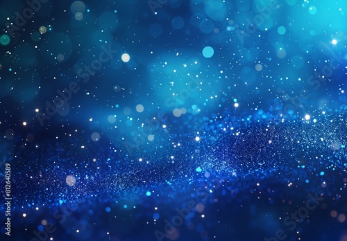 A mesmerizing image of glittering blue particles that evokes the vastness of the cosmos and a sense of wonder