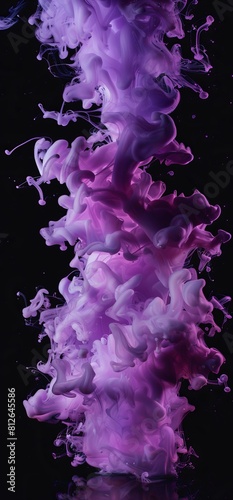 High-resolution image capturing the dynamic movement of purple ink merging with water on a black background