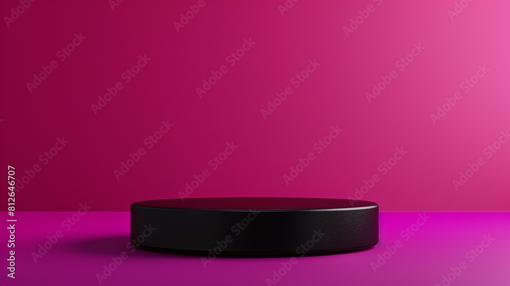 Black Round Object on Pink Background Black Round Object on Pink Background
