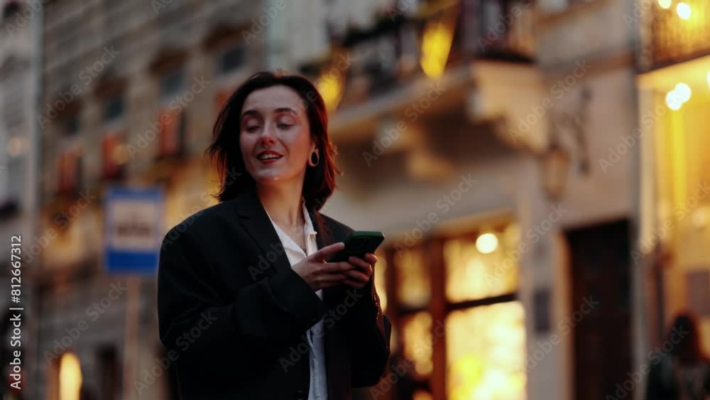 Portrait of young beautiful woman hold smartphone scrolling social media texting browsing online at evening urban city Pretty female relax enjoying great day after hard work late outdoors Portrait of young beautiful woman hold smartphone scrolling social media texting browsing online at evening urban city Pretty female relax enjoying great day after hard work late outdoors