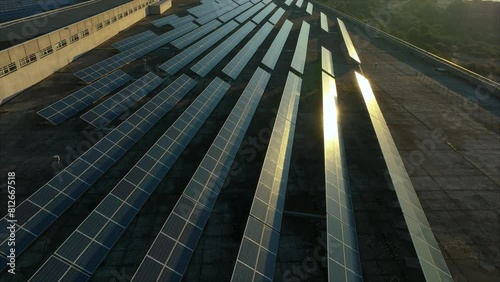 Photovoltaic system, Solar panels at dawn from top to bottom photo