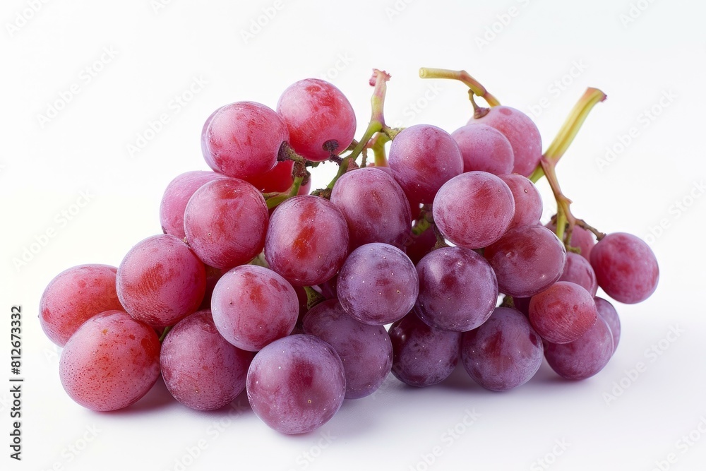 Juicy red grapes clustered together, isolated on a pure white background Juicy red grapes clustered together, isolated on a pure white background