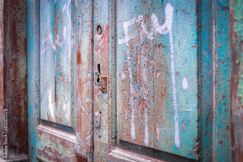 Paint texture of a blue wooden door of an abandoned house. Tenerife, Canary Islands, Spain. © Jess