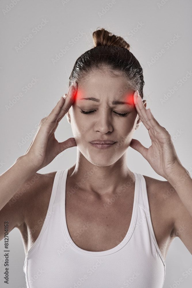 Woman, headache or hands in studio with pain for burnout, red and glowing with tension. Female person, health or fingers on backdrop with hurt for stress, exercise or sports with fatigue in Portugal Woman, headache or hands in studio with pain for burnout, red and glowing with tension. Female person, health or fingers on backdrop with hurt for stress, exercise or sports with fatigue in Portugal