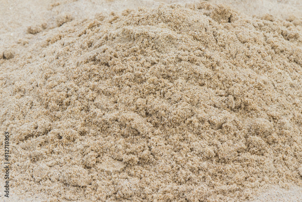 Sand on beach used for fun and build various shapes. Vacation time and child development
