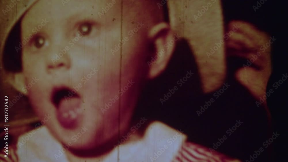 Old film strip of a little girl close up.