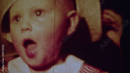 Old film strip of a little girl close up.