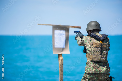 Soldier firing pistol gun