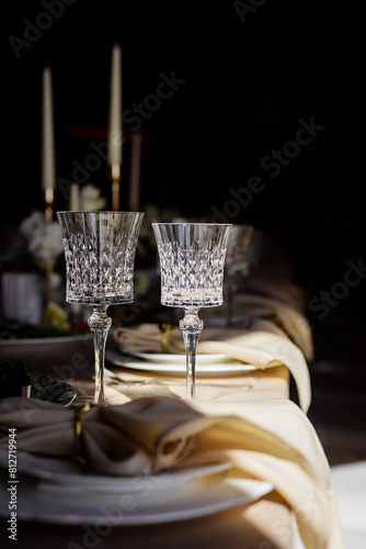 Сatering table with glass stemware at restaurant before party 