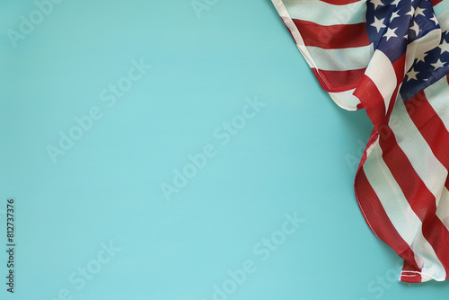 American flag against duck egg blue, a serene nod  Memorial Day.