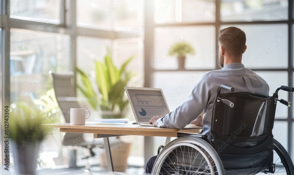 A disabled businessman in a wheelchair, Disability benefits A disabled businessman in a wheelchair, Disability benefits