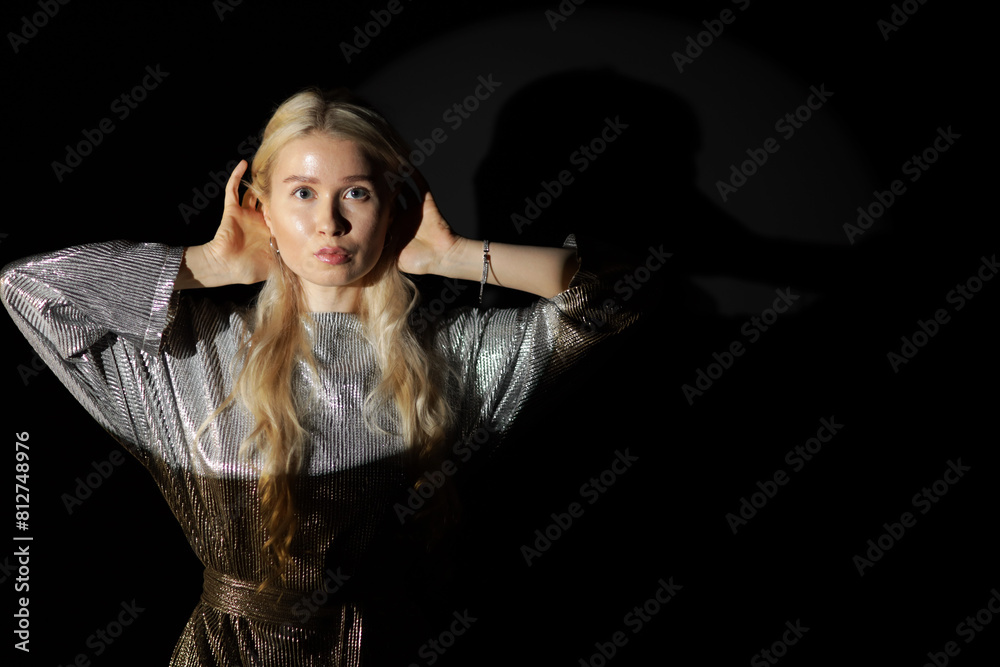 Low key portrait of beautiful young blonde woman Low key portrait of beautiful young blonde woman