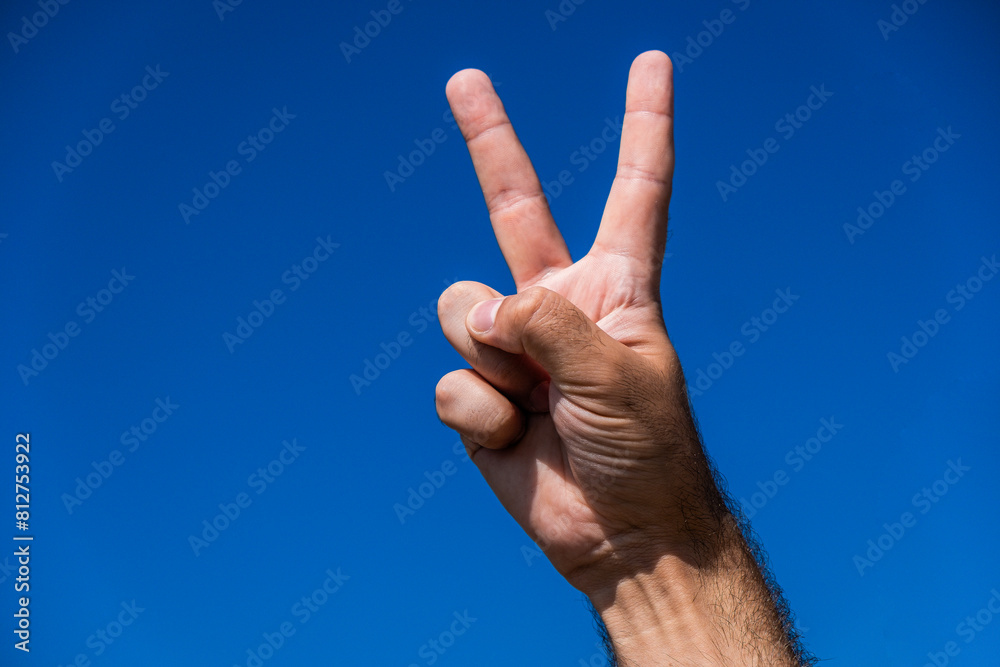 peace in the whole world. The man shows peace peace in the whole world. The man shows peace