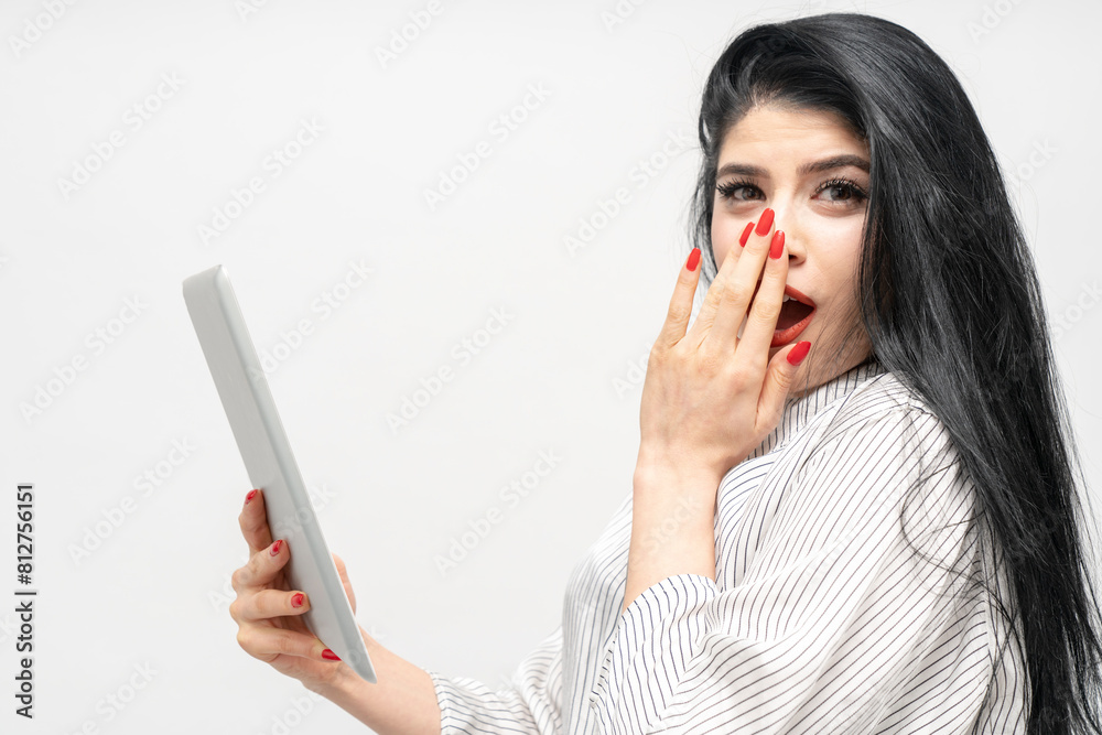 Portrait of young businesswoman using tablet on white background. Portrait of young businesswoman using tablet on white background.