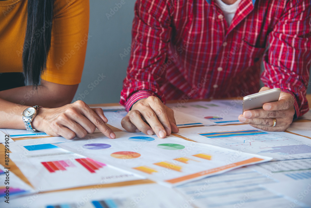 Obraz premium Top view business people meeting together at office desk in conference room. Team business meeting partnership planning brainstorming together. Team Collaborate group of partner company brainstorming