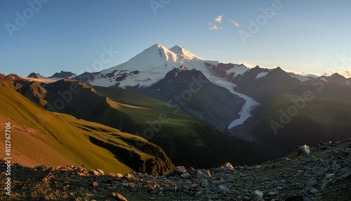 view of a mountain landscape at sunset near the mount elbrus karachay cherkess the caucasus russia photo