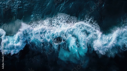 Fototapeta Naklejka Na Ścianę i Meble -  aerial top view background photo of ocean sea water white wave splashing in the deep sea --no text, human, watermark --chaos 10 --ar 16:9 Job ID: c4869641-1a6b-42f9-bd4a-8b49497cbc33