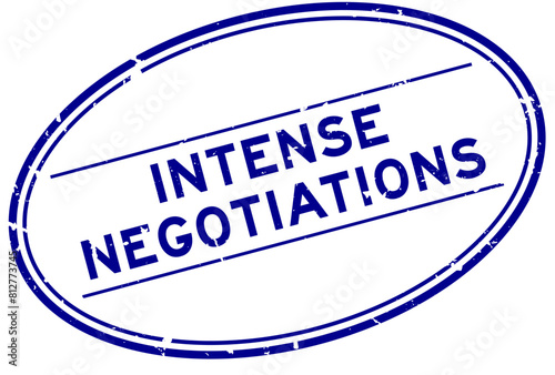 Grunge blue intense negotiations word oval rubber seal stamp on white background
