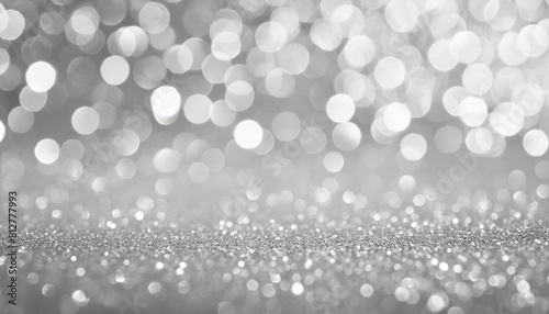 defocused christmas or party grey glitter background with bokeh holiday glowing backdrop banner or card